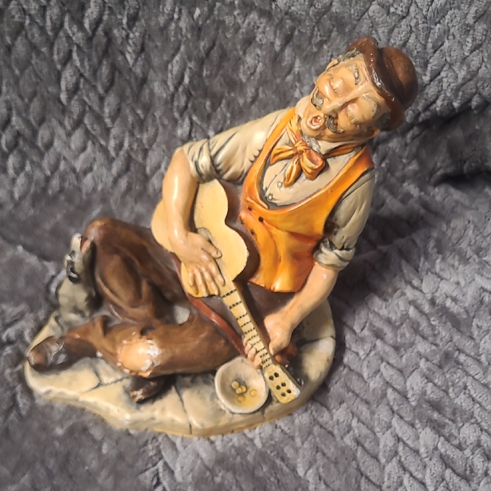 H12; Charming Brown and Orange Musician Figurine